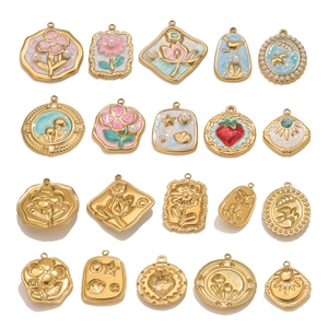 Mixed set of gold stainless steel charms with floral enamel patterns and faux pearls