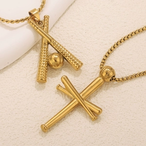 Macro shot of gold-plated stainless steel baseball bat pendant necklaces with polished finish