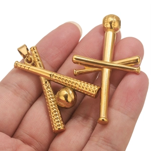 Macro shot of 18k gold-plated baseball bat pendants with cross-shaped textured handles