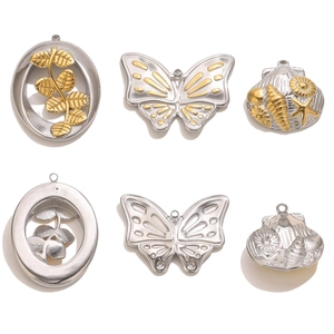 Pendentifs vintage en acier inoxydable papillon et coquillage avec détails dorés