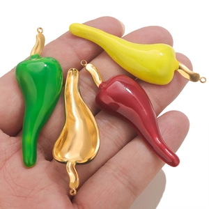 Set of four stainless steel chili pepper pendants in green, yellow, red and gold finish