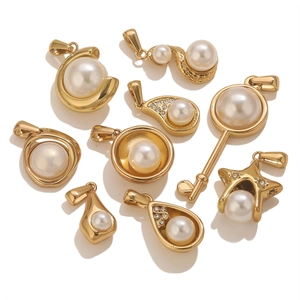 Detail of 9 assorted gold-plated pearl pendants featuring stars and geometric shapes