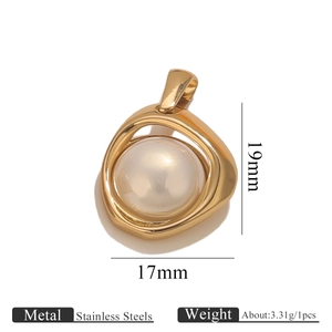 Macro detail of an 18K gold plated stainless steel pendant with white pearl inlay