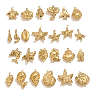 Assortment of PVD gold plated ocean charms including sea turtles and shells for jewelry DIY