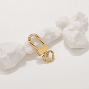 Golden stainless steel lobster clasp hook with swivel heart ring on white stones