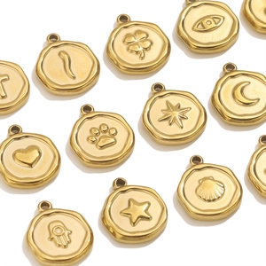 Gouden roestvrijstalen munt hangers met reliëf symbolen voor DIY sieraden maken projecten
