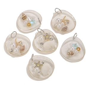 Set of 6 ocean style resin pendants with shells, pearls, and sea stars for DIY necklaces