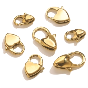 Detailed view of polished heart-shaped lobster clasps in 18K gold plated stainless steel