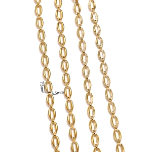 Macro shot of 18K gold plated coffee bean chain links showing 7.5mm x 4.5mm size specs