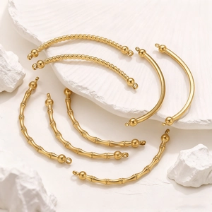 Gold-plated stainless steel curved tube connectors with twist, bamboo, and smooth designs