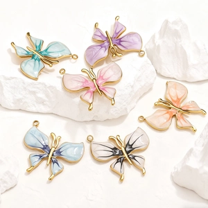 Colorful butterfly pendants in stainless steel with enamel wings for DIY jewelry making