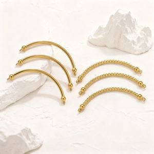 Set of six gold-plated curved stainless steel jewelry components with smooth and twisted textures