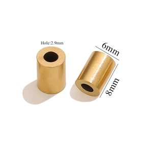 Detail of 6x8mm vintage gold stainless steel cylinder beads with 2.9mm inner hole