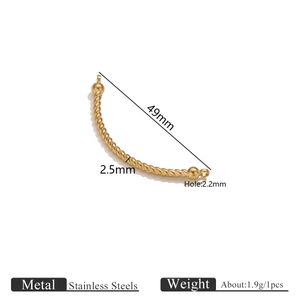 Detailed macro view of 49mm twisted gold stainless steel curved tube DIY jewelry connector