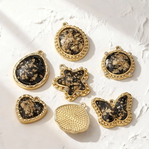 Vintage stainless steel pendants with black resin and gold foil for DIY jewelry making