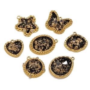 Vintage black and gold leaf stainless steel jewelry charms in star, heart and butterfly shapes