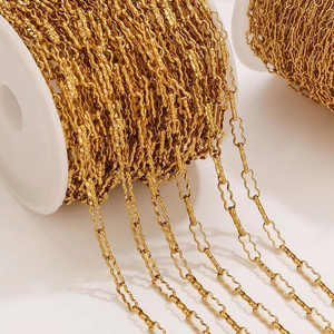 Irregular wavy stainless steel chain links on a spool for DIY jewelry making