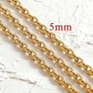 Detailed view of 5mm vintage twisted rope chain in polished gold stainless steel