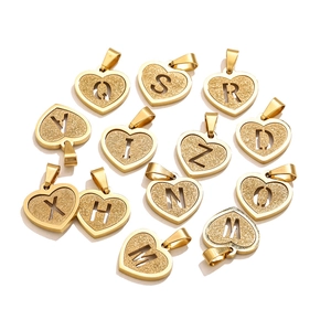Golden stainless steel heart-shaped initial pendants with glitter sand finish for DIY necklaces