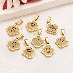 Gold plated stainless steel four-leaf clover letter pendants with sandblasted glitter finish