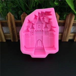 Macro detail of a pink silicone castle mold with towers and textured wall patterns