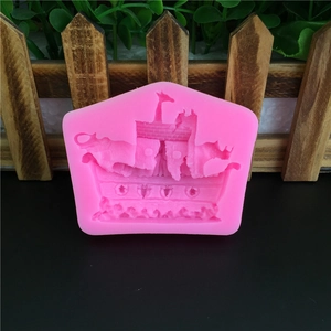 Detailed pink silicone mold featuring Noah's Ark with animal figures and boat structures