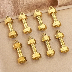 Macro detail of eight golden dumbbell pendants with textured grips and top rings