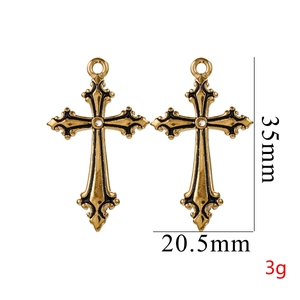 Gothic cross pendant detail showing 35mm height and 18K gold plated stainless steel