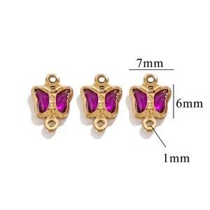 Three tiny golden stainless steel butterfly charms with purple enamel for jewelry making