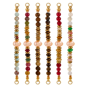 Detail of bohemian stainless steel bead charms with natural stones and central pearl