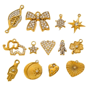 Set of gold stainless steel vintage charms with starfish heart and butterfly bow details
