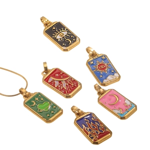 Enamel tarot card rectangle pendant in gold-plated stainless steel with mystical sun symbols
