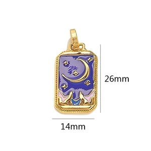 Detailed macro view showing the 26mm x 14mm celestial tarot pendant with moon and stars