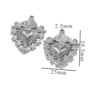 Macro detail showing dimensions of 25mm vintage heart pendant with angel wing design