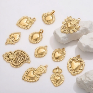 Golden 18K stainless steel heart and sun pendants with vintage filigree patterns