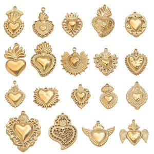 Golden 18K stainless steel heart charms collection with varied vintage sunburst designs