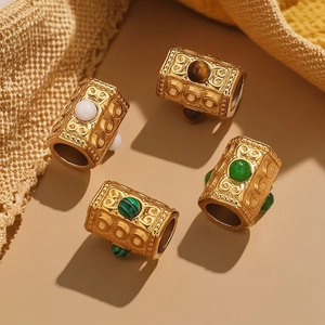 Goldene Edelstahl-Zylinderperlen mit Vintage-Schnörkeln und eingelegten Edelsteinen