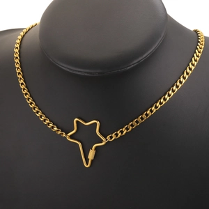 Macro view of gold-plated stainless steel star pendant and screw lock clasp detail