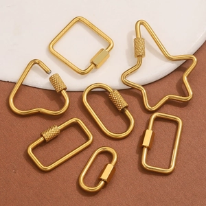 Golden stainless steel screw clasp connectors in star, heart, and geometric shapes