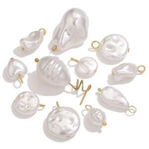 Assorted faux pearl pendants in various shapes with gold metal loops for DIY jewelry making