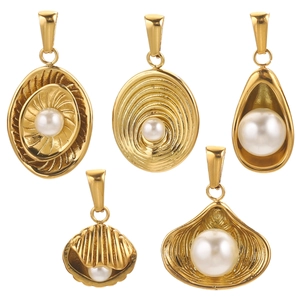 Detail view of five gold-plated steel pendants with white pearls in various shell designs