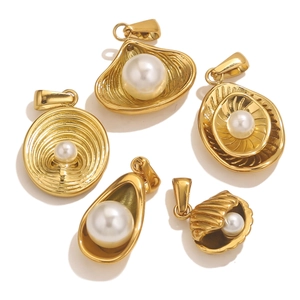 Detail of five assorted irregular gold stainless steel pearl charms for DIY jewelry making