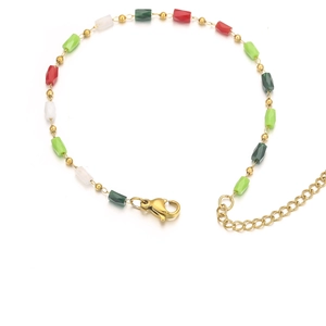 Close-up of multicolor faceted stone beads on an 18k gold-plated stainless steel bracelet