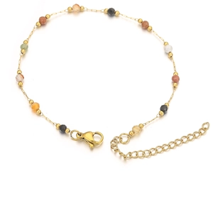 Macro shot of 18k gold plated chain with colorful natural stones and lobster clasp