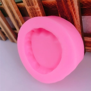 Pink circular silicone mold for DIY fondant cake decorating and handmade soap crafts