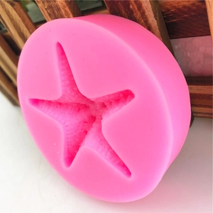 Pink silicone starfish mold for chocolate and fondant cake decorating DIY projects