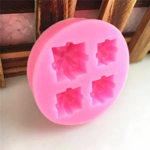 4-cavity round pink silicone mold featuring intricate snowflake designs for DIY baking crafts