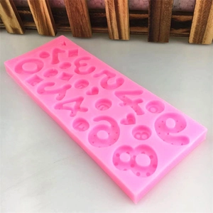 Pink silicone number mold for DIY fondant cake decoration featuring digits and heart shapes
