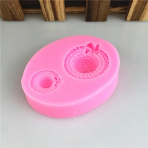 Pink silicone mold with dual mini straw hat shapes for DIY fondant cake decoration