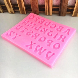 Pink silicone mold featuring 26 uppercase English letters for DIY chocolate and cake baking